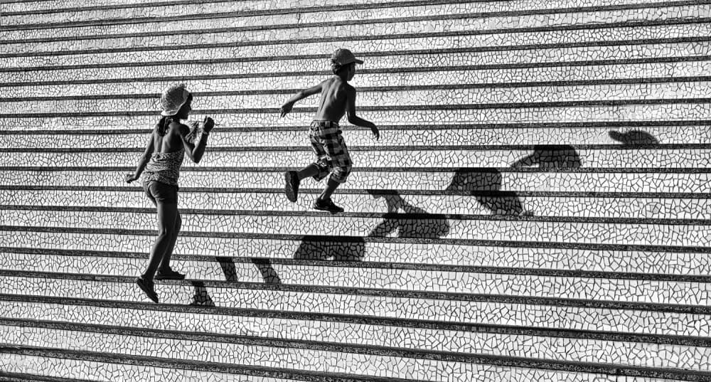 Running Kids Shadows Stairs by Juan Luis Duran — canvas wall art