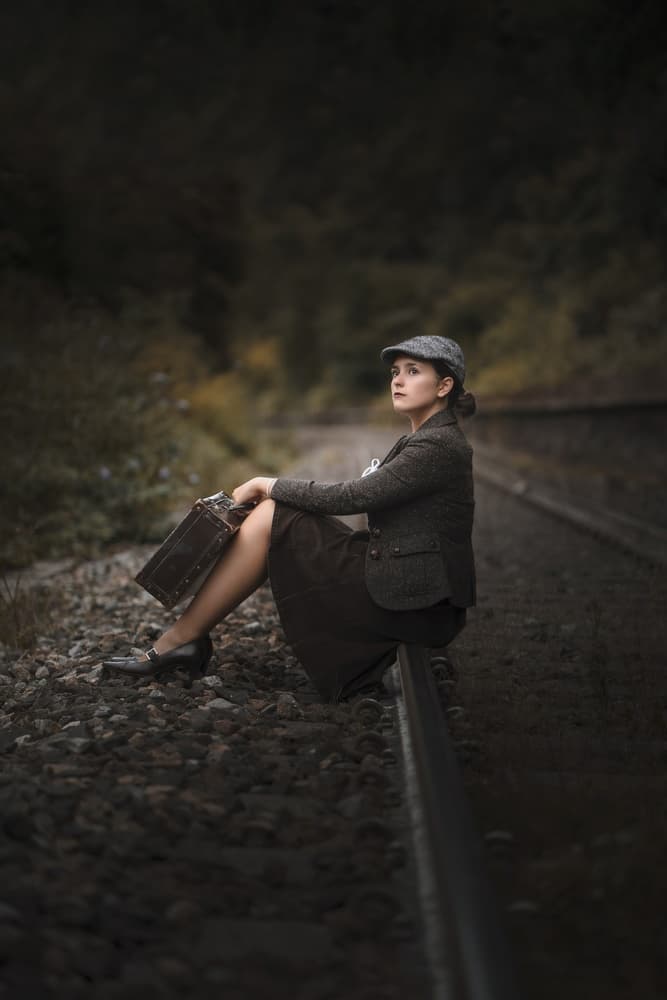 Vintage Traveler Waiting by Domenico Petrocca — canvas wall art