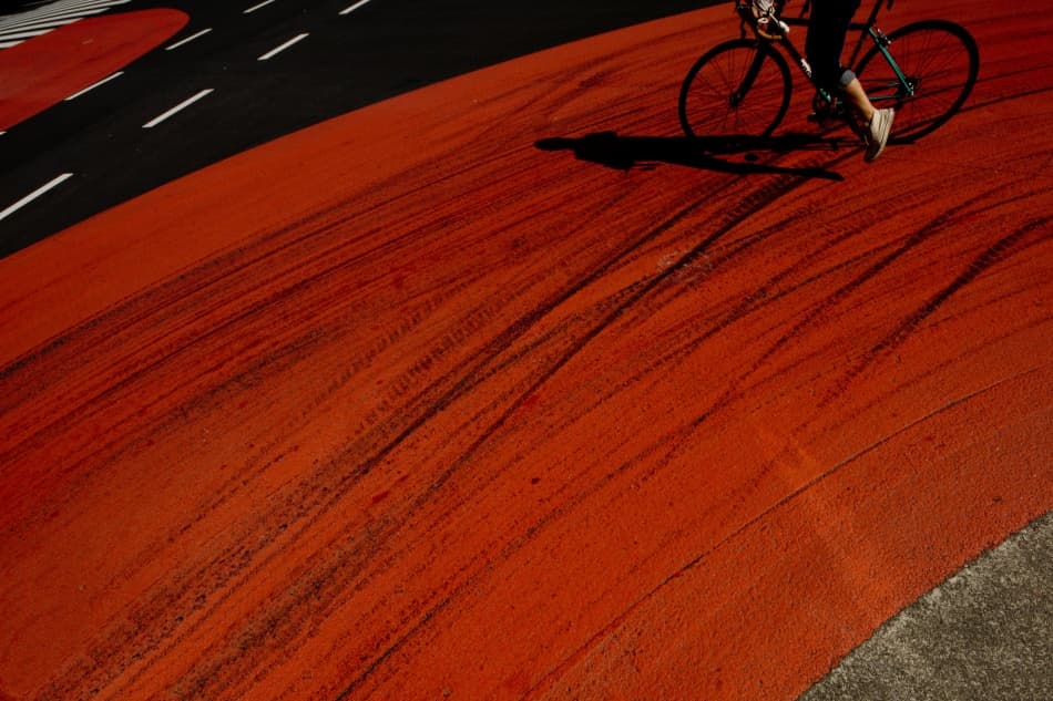 Red Path Cyclist by Kouji Tomihisa — canvas wall art