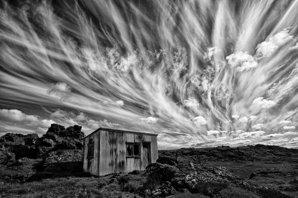 Stark Shack Dramatic Sky by Þorsteinn H. Ingibergsson — canvas wall art