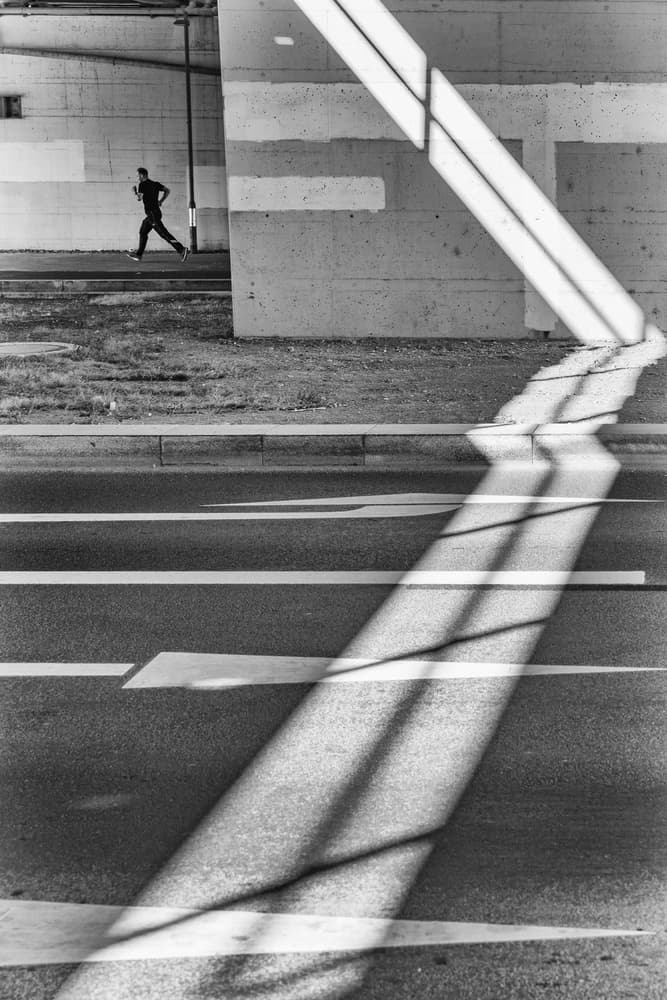 Urban Runner's Shadow by Andy Bauer — canvas wall art