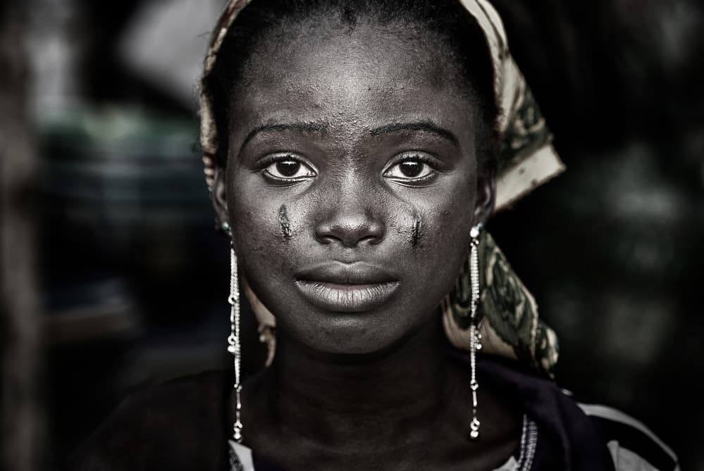 Tribal Woman Gaze by Joxe Inazio Kuesta Garmendia — canvas wall art