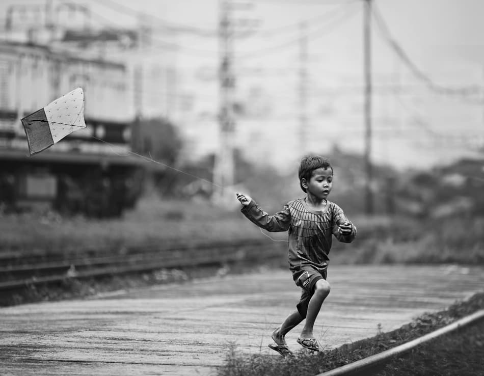 Carefree Kite Runner by Sebastian Kisworo — canvas wall art