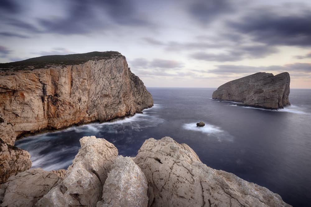 Dramatic Cliffs and Serene Sea by Paolo Bolla — canvas wall art