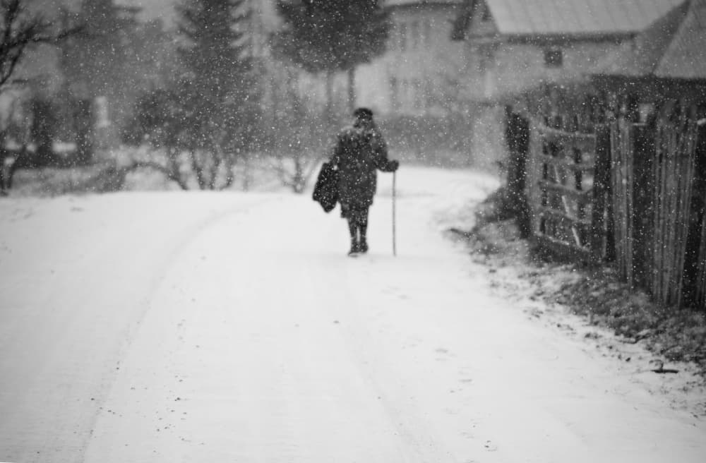 Lone Winter Stroll by Julien Oncete — canvas wall art