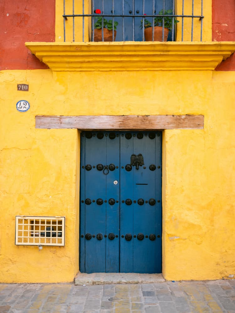 Blue and Yellow | Oaxaca Mexico by Raisa Zwart — canvas wall art