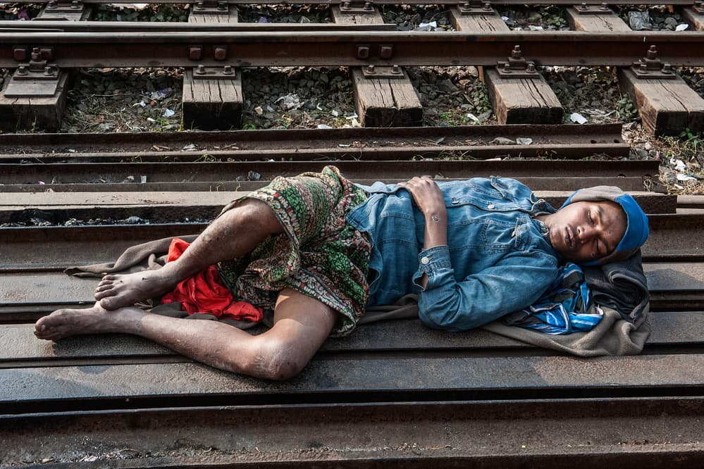 Man Sleeping On Tracks by Joxe Inazio Kuesta Garmendia — canvas wall art