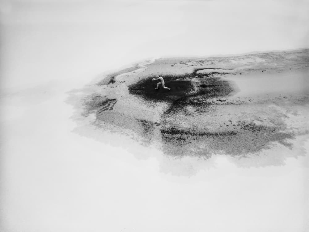 Solitary Figure Stark Landscape by Leszek Paradowski — canvas wall art