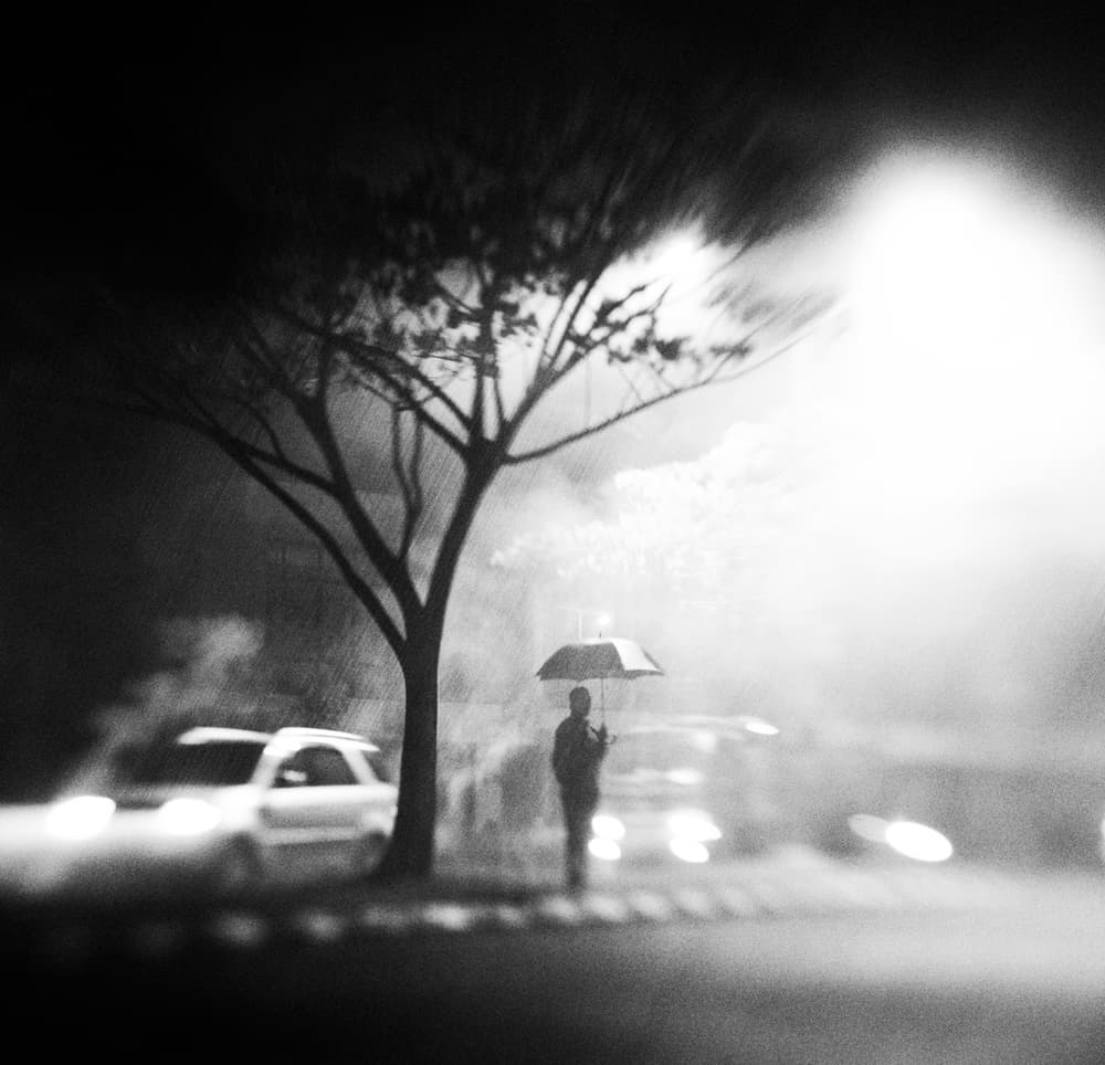 Rainy Night Solitude by Hari Sulistiawan — canvas wall art