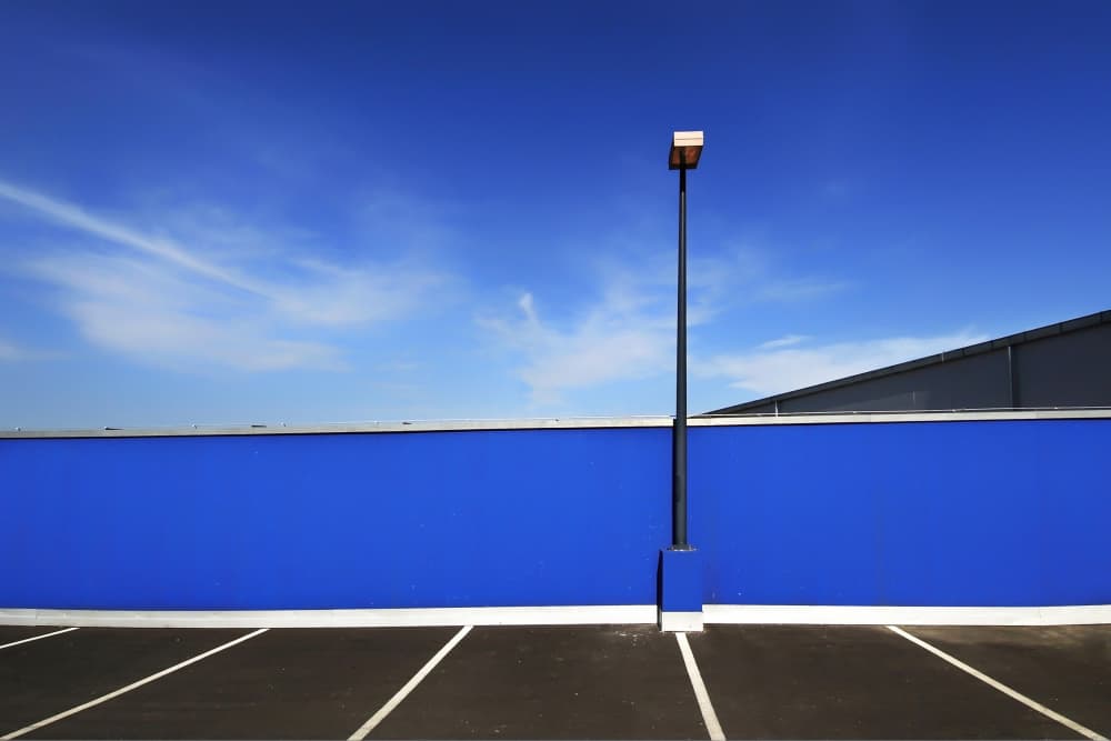 Minimalist Blue Parking by Jure Kravanja — canvas wall art