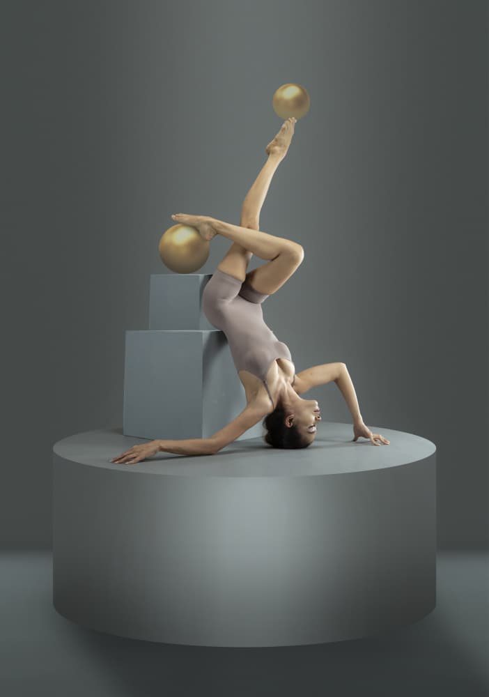 Acrobat Gold Ball Balance by Ajar Setiadi — canvas wall art