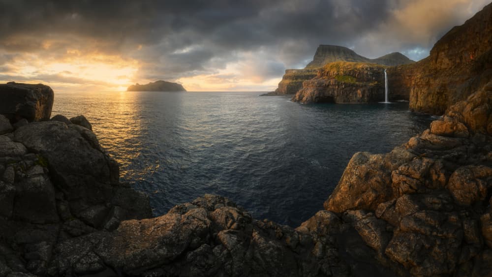 Cliffs and Waterfall Sunset by Tomasz Rojek — canvas wall art