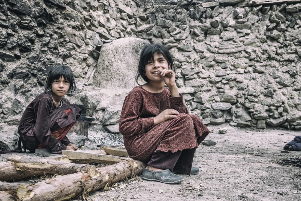 Smiling Village Girls by Marcel Rebro — canvas wall art