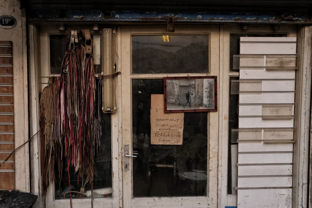 Weathered Shop Door by Ali Ayer — canvas wall art