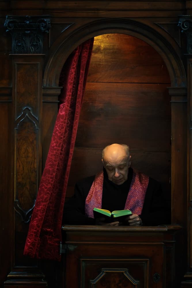 Monk Reading in Confessional by Roberto Marini — canvas wall art