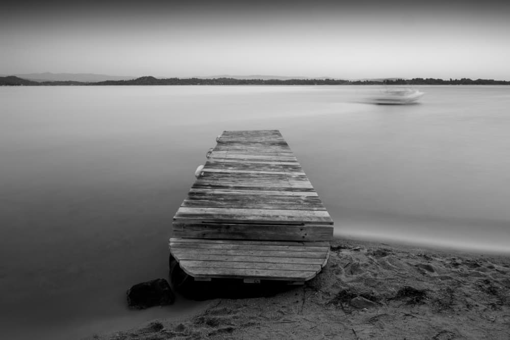 Tranquil Lake Pier by Catalin Baican — canvas wall art