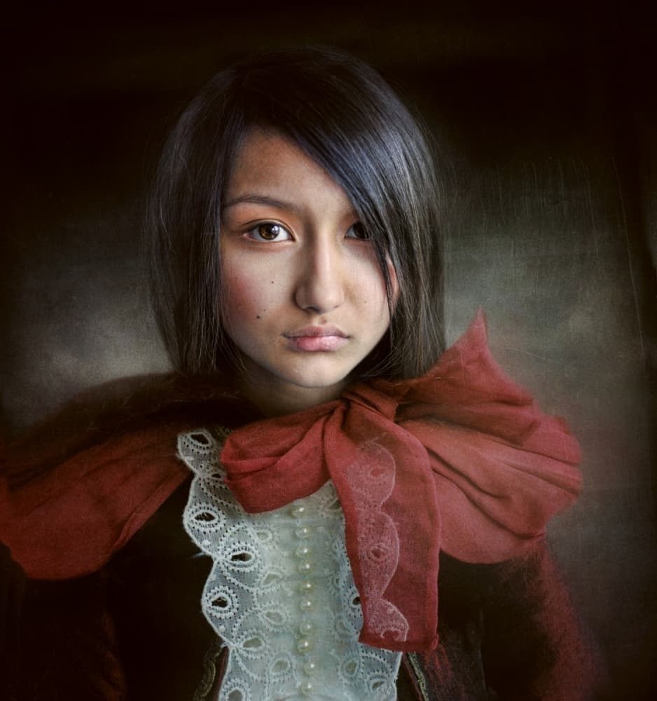 Pensive Girl Red Bow by Svetlana Melik-Nubarova — canvas wall art