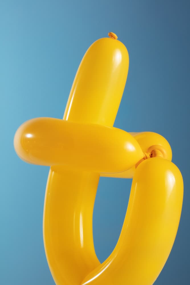 Playful Yellow Balloon by Julia Ramiro — canvas wall art
