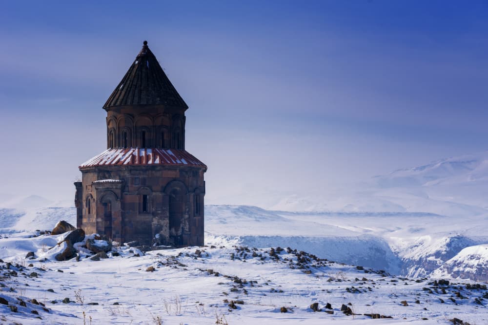 Ancient Winter Church by Merthan Kortan — canvas wall art