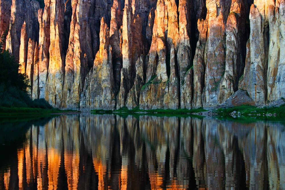 Golden River Reflections by Alexey Kharitonov — canvas wall art