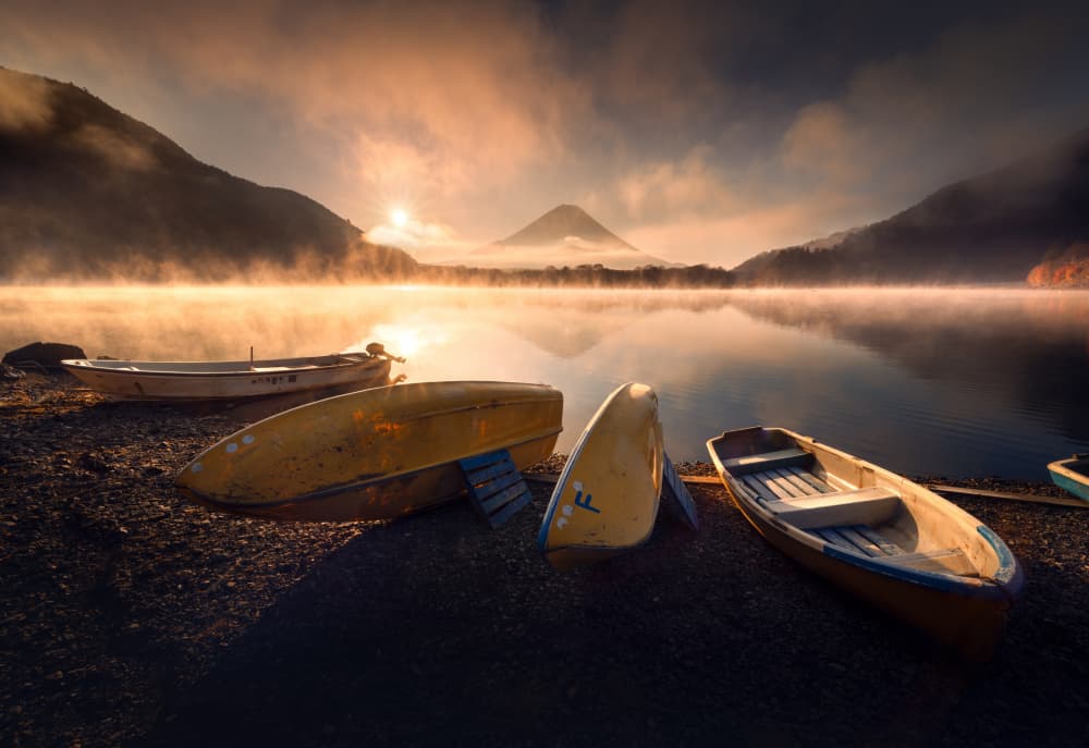 Misty Morning Lake Boats by Karol Nienartowicz — canvas wall art