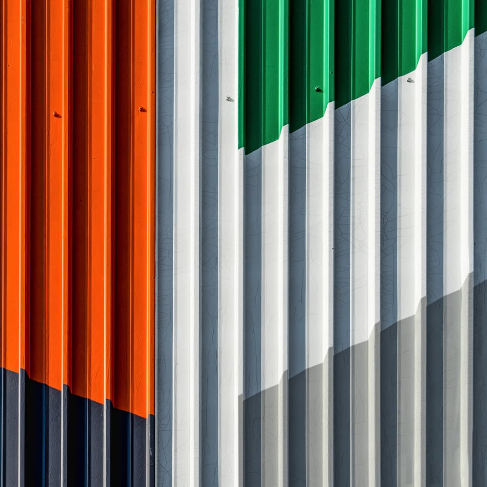 Corrugated flags by Luc Vangindertael (laGrange) — canvas wall art