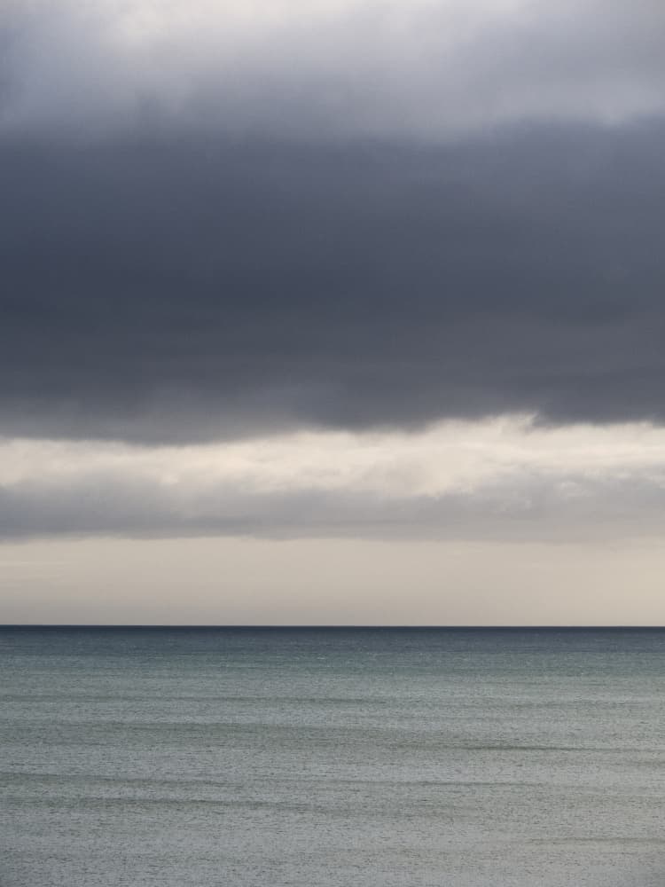 Calm Ocean Dark Sky by Lynann Colligan — canvas wall art
