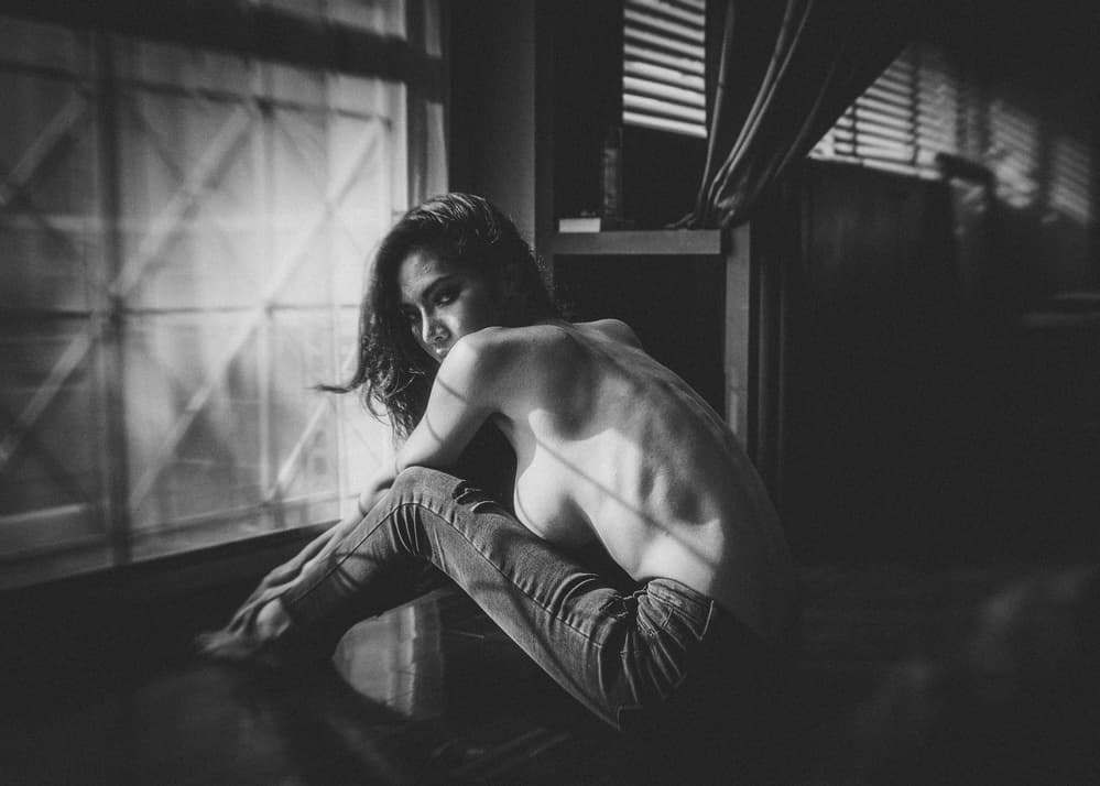 Woman In Window Light by ADIREK M — canvas wall art