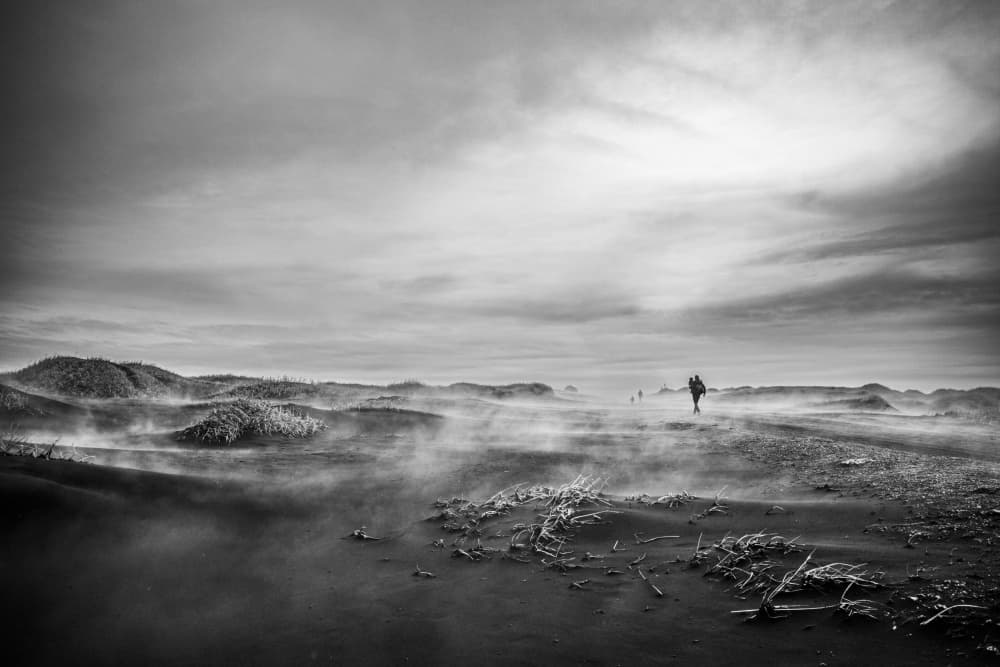 Solitary Hiker Misty Sands by Pawel Majewski — canvas wall art