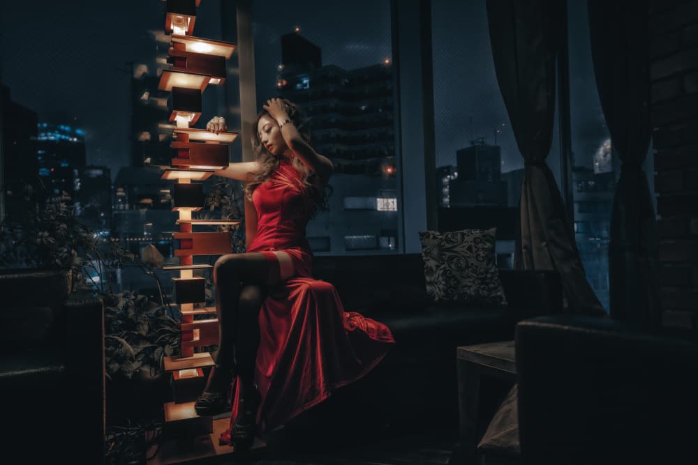 Woman In Red City View by KOIKI — canvas wall art