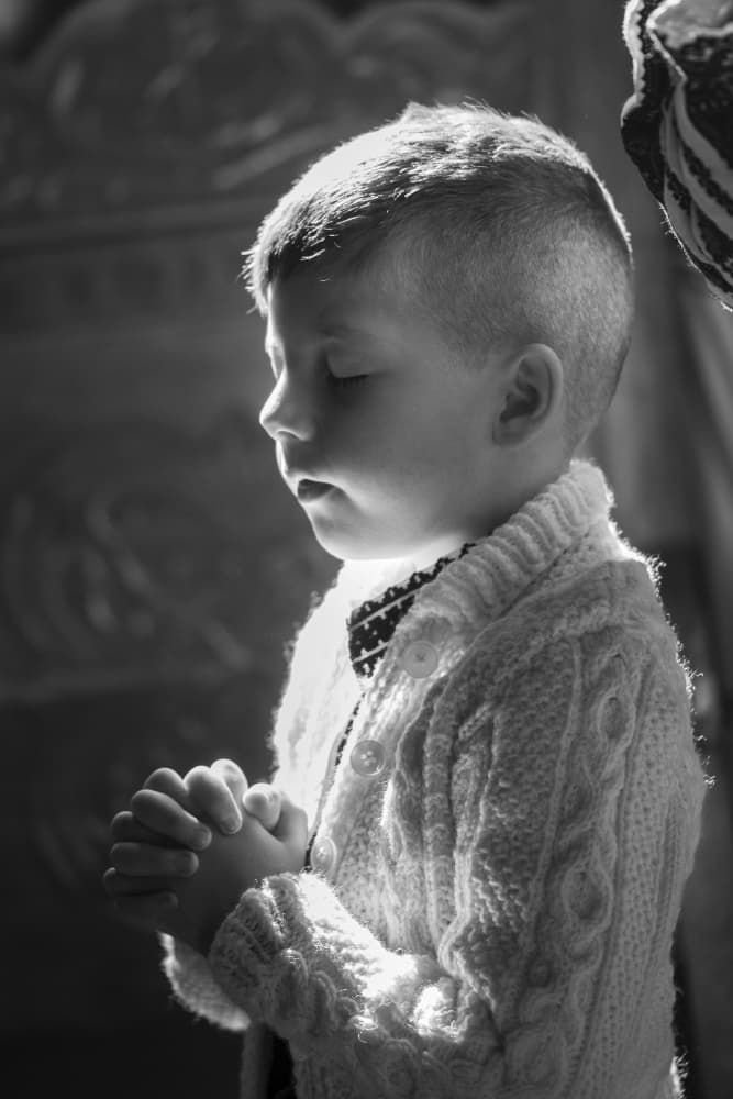 Praying Child in Light by Sveduneac Dorin Lucian — canvas wall art