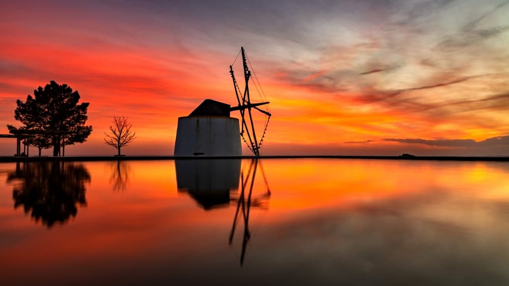Dramatic Sunset Reflection by Gonçalo Capitão — canvas wall art