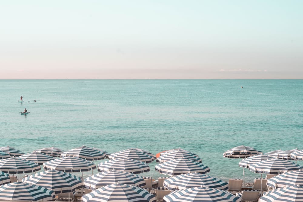 Oceanfront Striped Umbrellas by Talitha McQueen — canvas wall art
