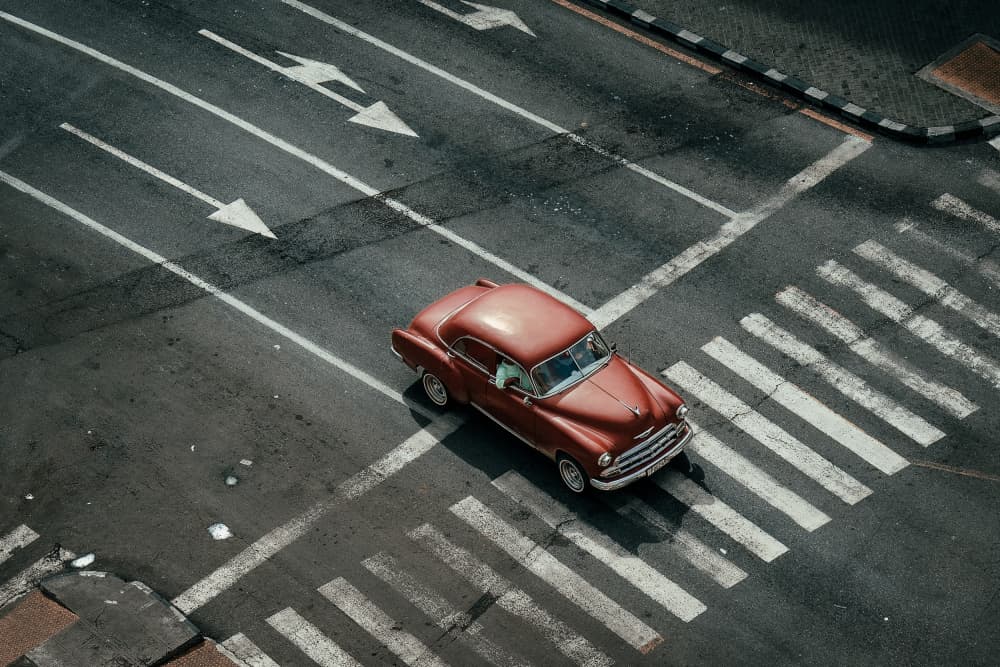 Red Vintage Car Intersection by Andy Bauer — canvas wall art