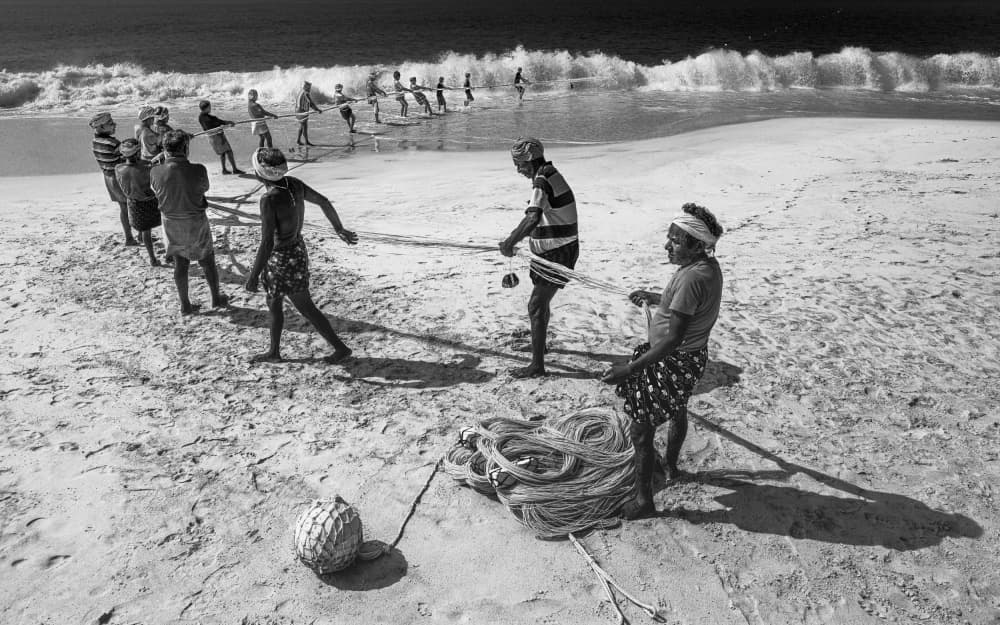 Traditional Beach Fishing by Marco Tagliarino — canvas wall art