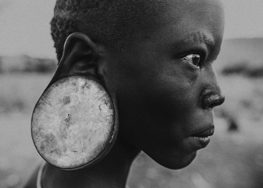 African Wooden Earlobe by Joxe Inazio Kuesta Garmendia — canvas wall art