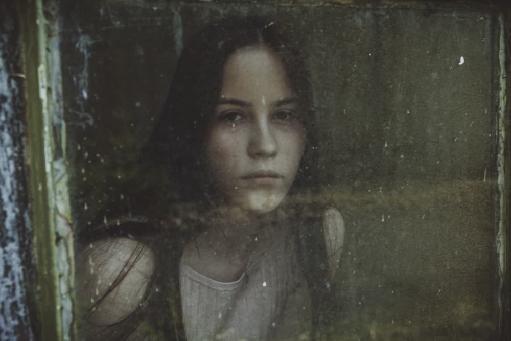 Pensive Girl Through Glass by Georgios Bero — canvas wall art