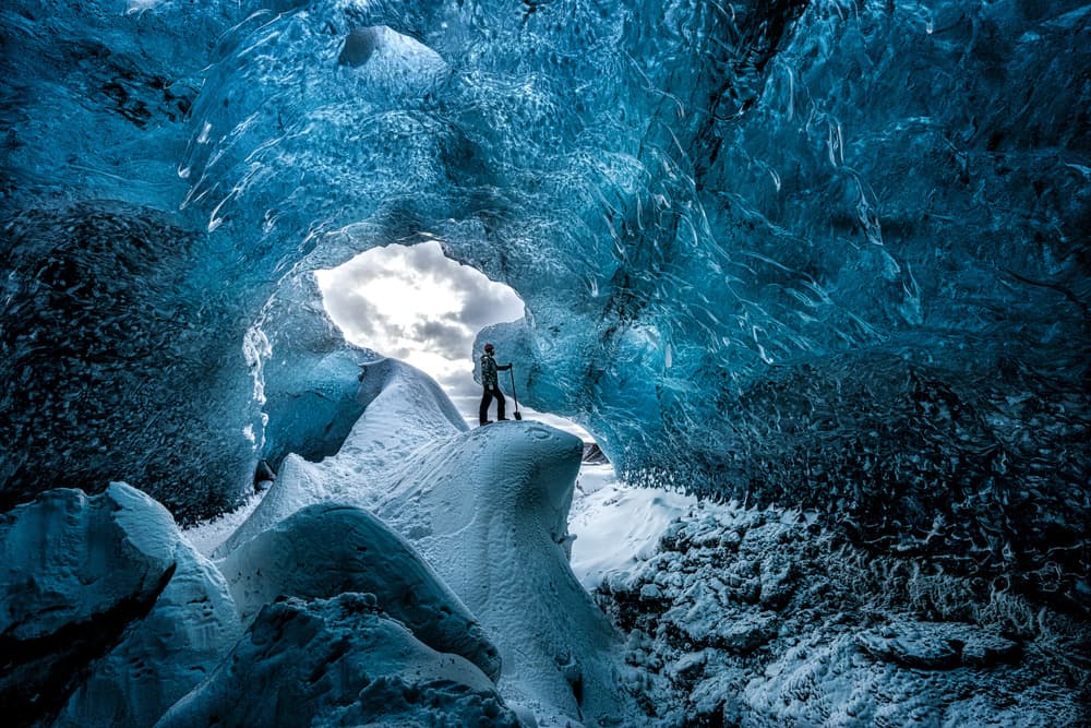 Blue Ice Cave Explorer by Alfred Forns — canvas wall art