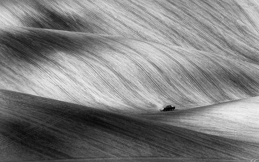 Truck in Rolling Fields by Piotr Krol (Bax) — canvas wall art