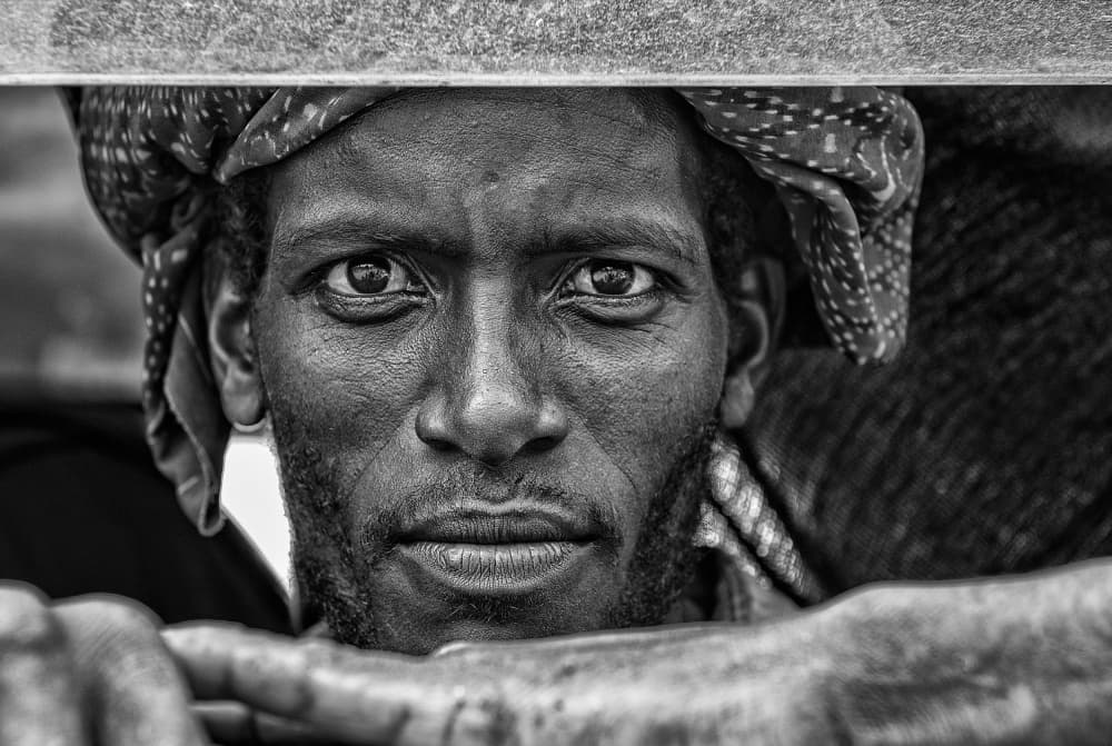 Man's Intense Gaze by Joxe Inazio Kuesta Garmendia — canvas wall art