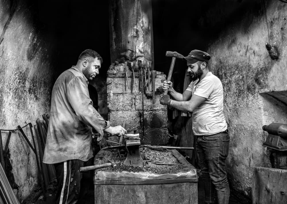 Forge Workshop Men by Bashar Alsofey — canvas wall art
