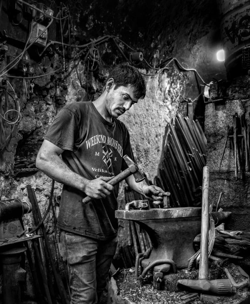 Blacksmith at Work by Bashar Alsofey — canvas wall art