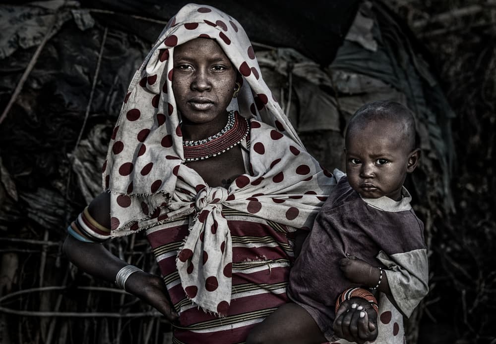 African Mother and Child by Joxe Inazio Kuesta Garmendia — canvas wall art