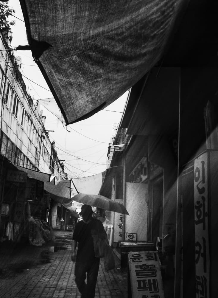 Rainy City Alley by Mi Young Choi — canvas wall art