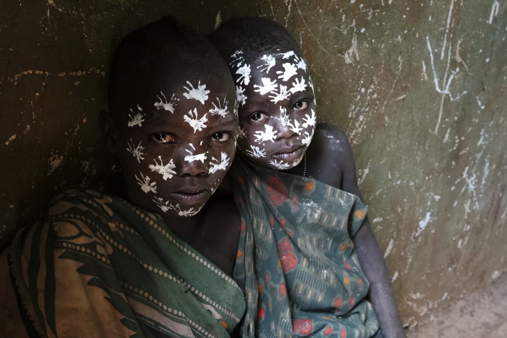 African Painted Faces by Elena Molina — canvas wall art