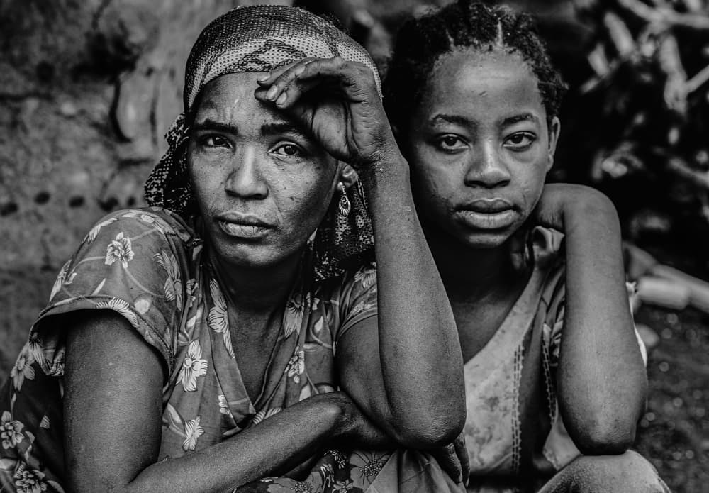 Mother Daughter Pensive Gaze by Joxe Inazio Kuesta Garmendia — canvas wall art