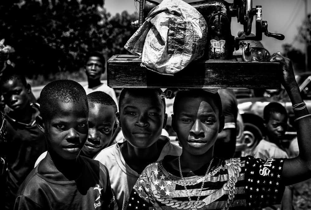 In a market in Benin. by Joxe Inazio Kuesta Garmendia — canvas wall art