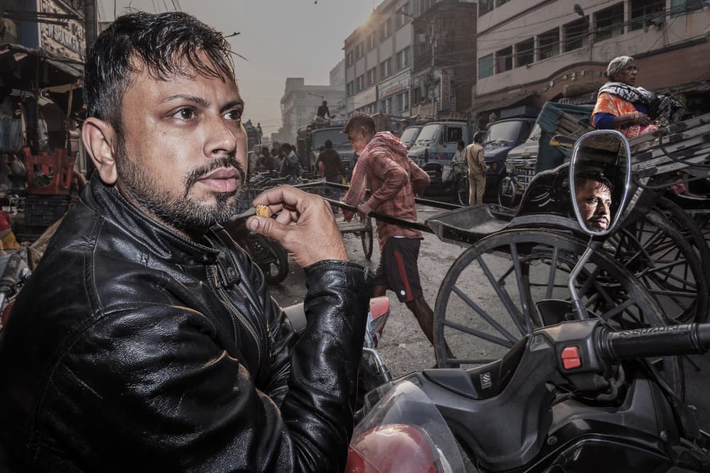 Urban Rider's Reflection by Kuntal Biswas — canvas wall art