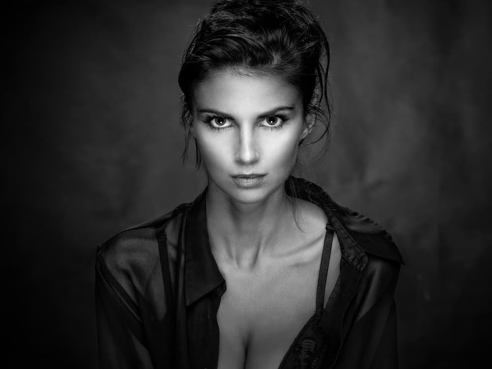 Woman with Intense Gaze by Luc Stalmans — canvas wall art