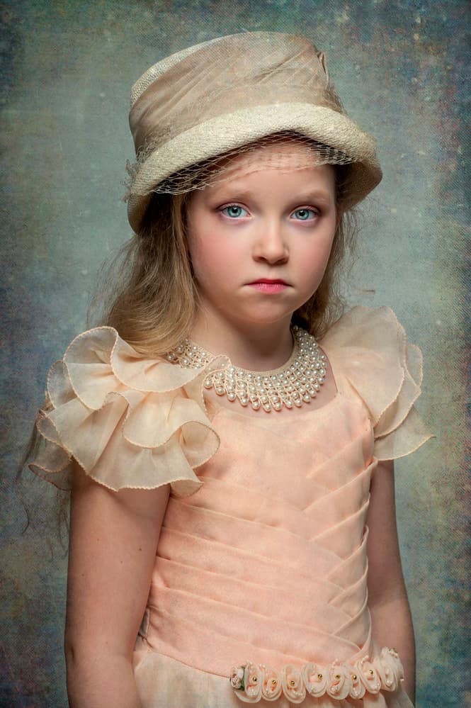 Solemn Child Portrait by Monika Vanhercke — canvas wall art